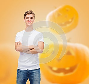 Smiling young man in blank white t-shirt