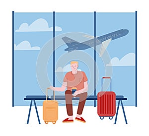 Smiling Young Man Holding Coffee Cup in Hand Sitting with Suitcases Bags Luggage in Airport with Flying Plane