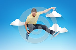 Smiling young man jumping in air