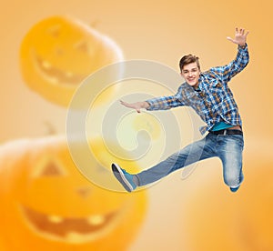 Smiling young man jumping in air