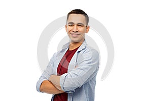 Smiling young man over white background