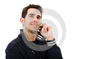 Smiling young man on the phone