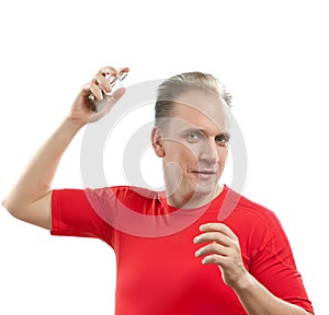 The smiling young man in a red T-shirt