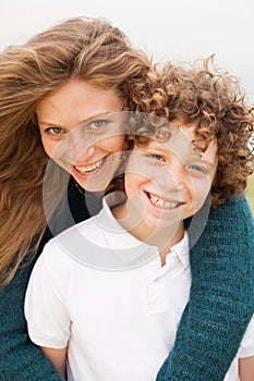 Smiling young mother with son