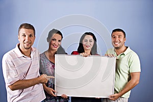 Smiling young people with add banner