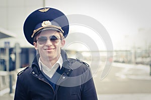 Smiling young pilot in Kastrup airport