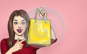 Smiling  young sexy woman pointing on  shopping  bag in comic style.  Pop Art  wow girl. Sale