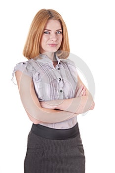 Smiling young woman in blouse and skirt