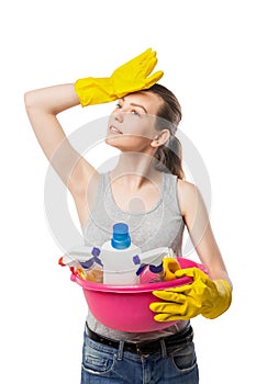 Smiling young woman with cleansers isolated