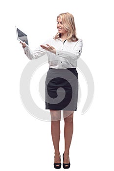 smiling young woman with a digital tablet. isolated on a white background.