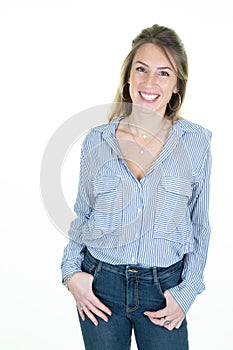 Smiling young woman girl in shirt jeans posing isolated on white wall background studio portrait