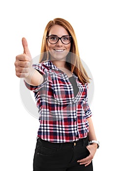 Smiling young woman giving approval with thumbs up