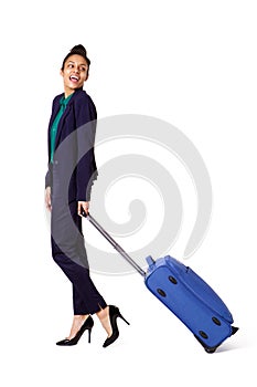 Smiling young woman going on business trip