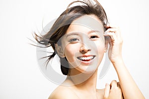 Smiling young Woman with hair motion