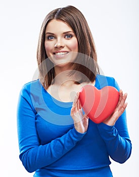 Smiling young woman hold red heart, Valentine day