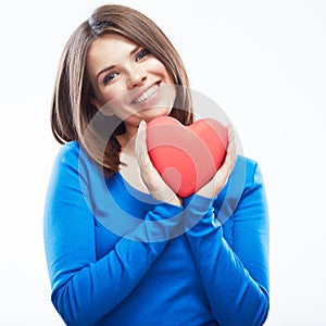 Smiling young woman hold red heart, Valentine day symbol. Girl