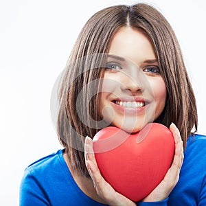 Smiling young woman hold red heart, Valentine day symbol. Girl