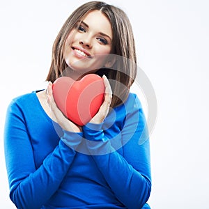 Smiling young woman hold red heart, Valentine day symbol. Girl