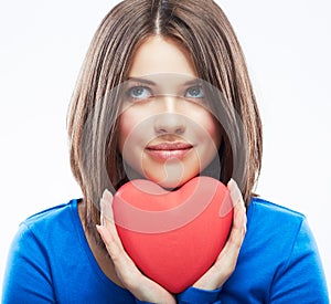 Smiling young woman hold red heart, Valentine day symbol. Girl