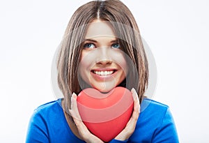 Smiling young woman hold red heart, Valentine day symbol. Girl