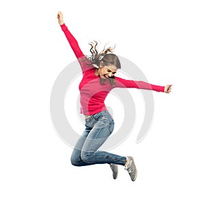 Smiling young woman jumping in air