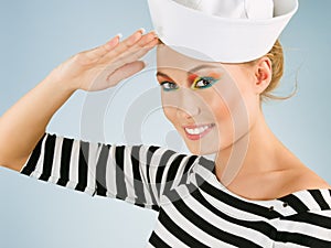 Smiling young woman like a sailor