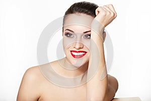 Smiling young woman model with glamour red lips