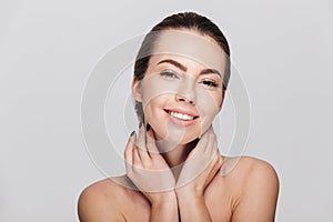 smiling young woman with perfect skin photo