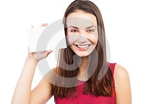 Smiling young woman showing a blank card