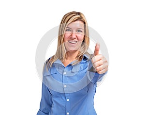 Smiling young woman showing thumb up isolated