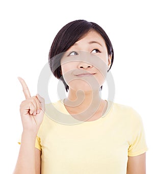 Smiling young woman standing and make a gesture