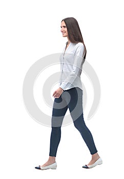 Smiling young woman stepping forward. isolated on white