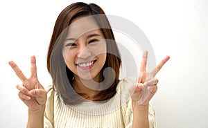 Smiling Young Woman Two Finger Peace Sign Hand Gesture