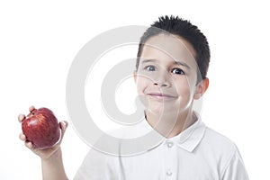 Smilling child with apple.