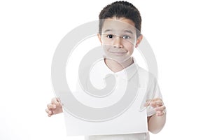 Smilling child with sheet of paper.