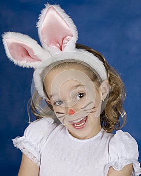 Smilling girl with bunny