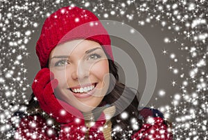 Smilng Woman Wearing Winter Hat and Gloves with Snow Effect