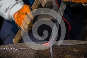 Smith forging hot iron