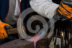 Smith forging hot iron