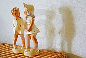 Smitten - Young Boy and Girl figurines photo