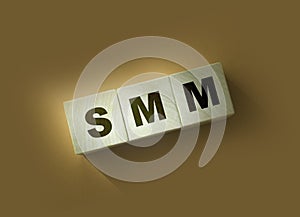 SMM abbreviation on wood cubes. Social media marketing. Business concept