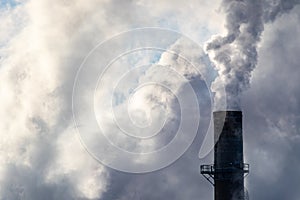 Smoke Billows From an Industrial Smokestack