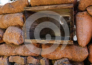 smoke from a bomb explosion seen from the slit of a trench made with sandbags