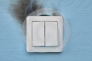 Smoke and burn mark on electric light switch