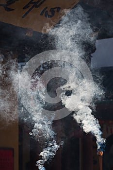 Smoke of burning incense at a temple in China