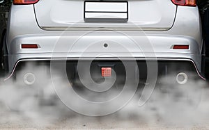 Smoke from a car producing pollution,smoke car pipe exhaust