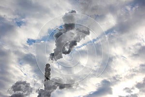 Smoke from the chimney of an industrial enterprise in the sk