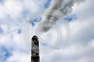 Smoke from the chimney of an industrial enterprise in the sk