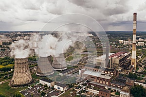 Smoke from chimneys of thermal power plant or station, aerial view from drone