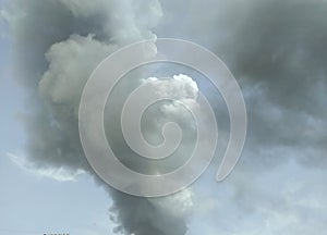 Smoke cloudy blue sky